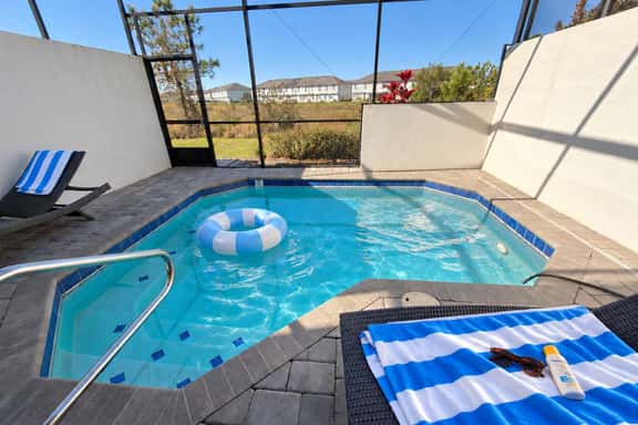 Escape to a 4BR Villa w/ Arcade, Pool & Mini Golf - Image 1